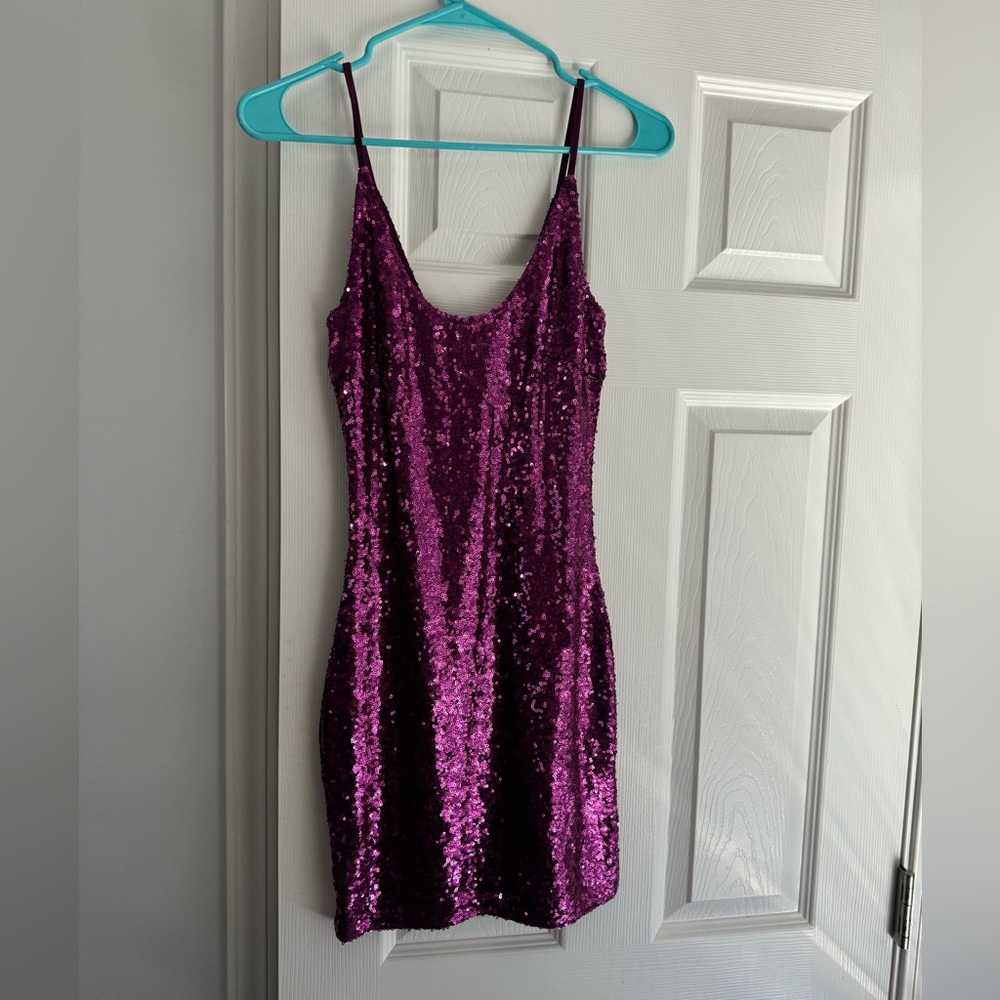 Spaghetti strap, sequin mini dress.